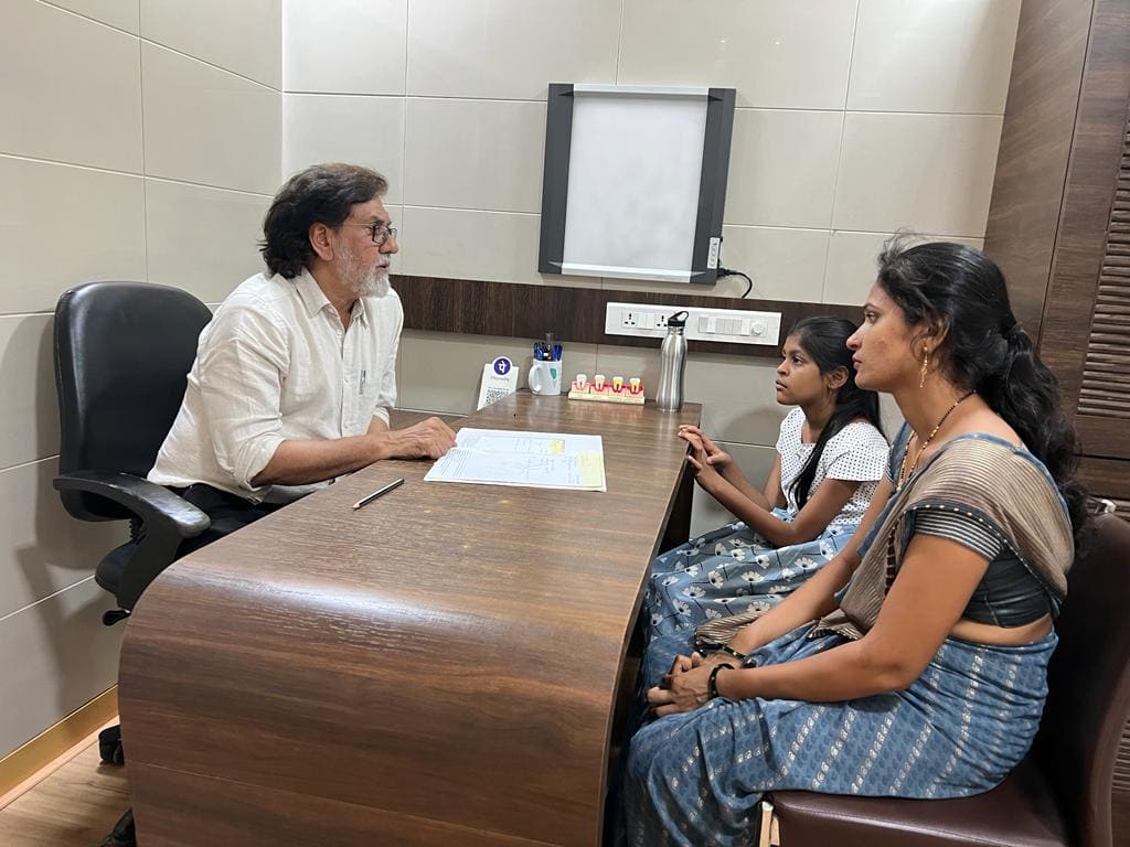 Dr. Vinod Vij with Patients